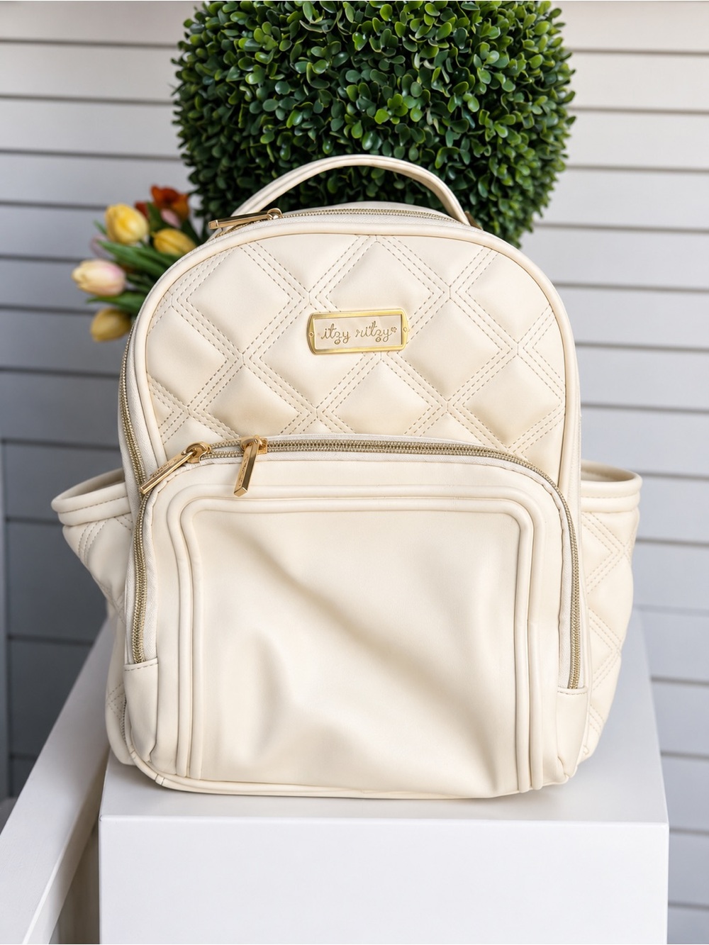 Itzy Ritzy Cream Quilted Backpack